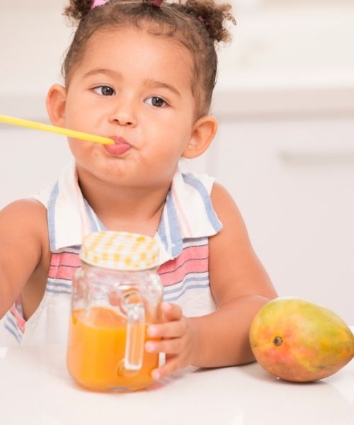 A child drinking juice