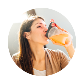 A woman drinking healthy fresh juice